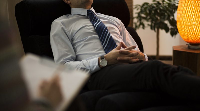 Close-up of burnt-out corporate employee