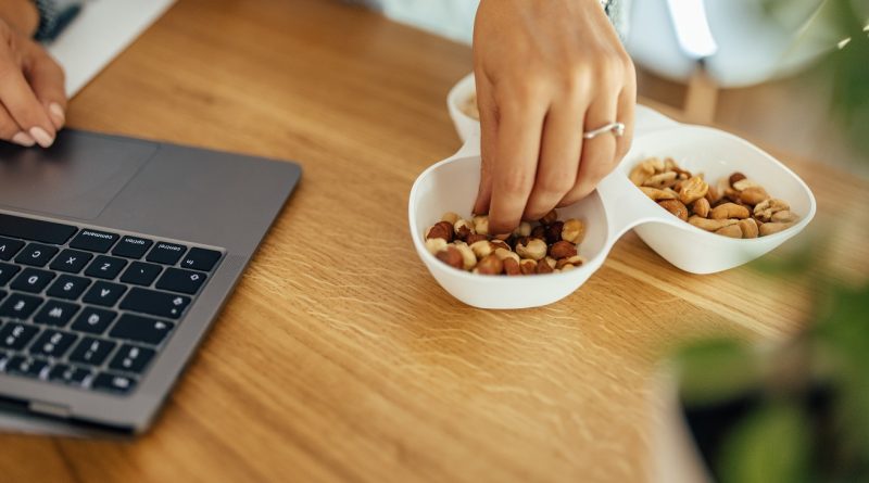 Having a healthy snack while working.